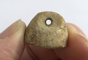 3000-2500 BC Ceramic Stamp Seal with Cross or “X” suspension hole