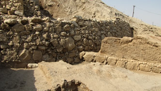 Remains of the retaining wall at Jericho that supported the mud brick wall that collapsed