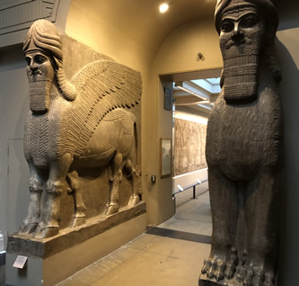 Lamassu or cherubim designed as human-headed, eagle-winged, bulls or lions that protected Sargon's palace in 713 BC