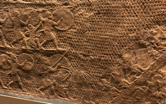 Lachish Siege - Assyrian foot soldiers approaching the city wall of Lachish