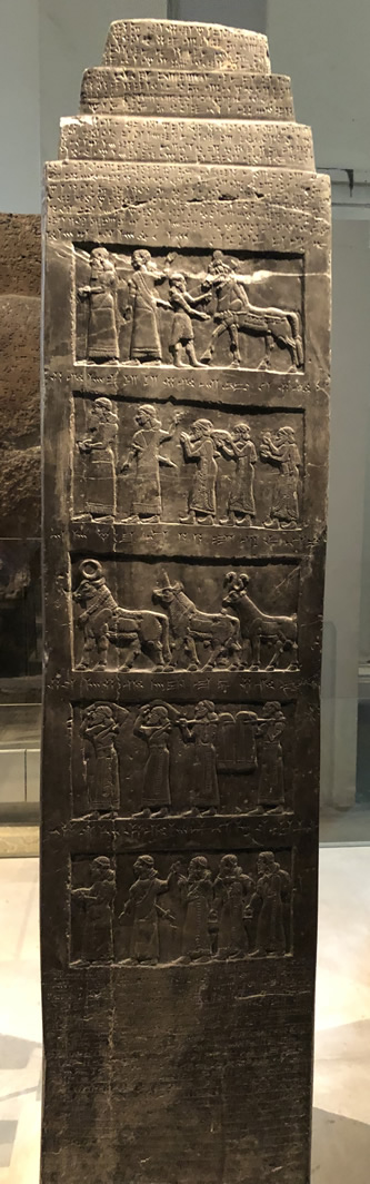 Shalmaneser black obelisk side B shows Israelites bearing tribute in the second row below the cuneiform inscription that describes the scene