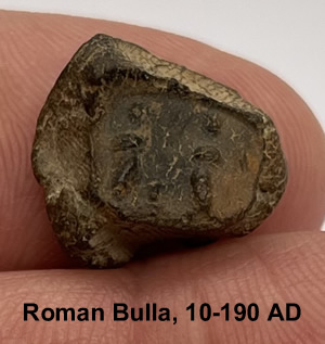 10-190 AD Roman Clay Bulla obverse side shows a man standing on left facing a goddess