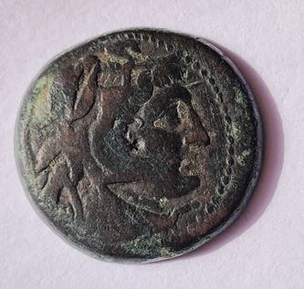 Image of Alexander the Great on a coin minted by Ptolemy IV in 229-219 BC