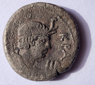 Reverse side of a Nero coin shoing Nero wearing an Egyptian headdrress as ruler of Egypt