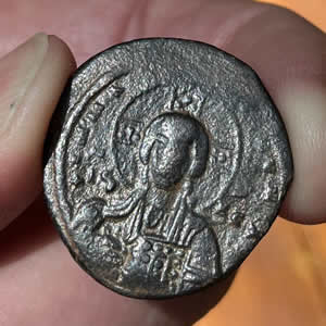Byzantine Coin 995-1025 with bust of Christ holding Book of Gospels during reign of Basil II