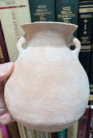 2300-2000 BC, A clay storage Jug, a decorated Terracotta Jar