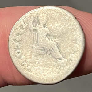74 AD Vespasian silver denarius, reverse: Vespasian seated on corule chair feet on stool holding vertical sceptre in right hand and extending branch with left, PON MAX TR P COS V pontifex Maximus, Tribunicia Potestate, Consul Quintum