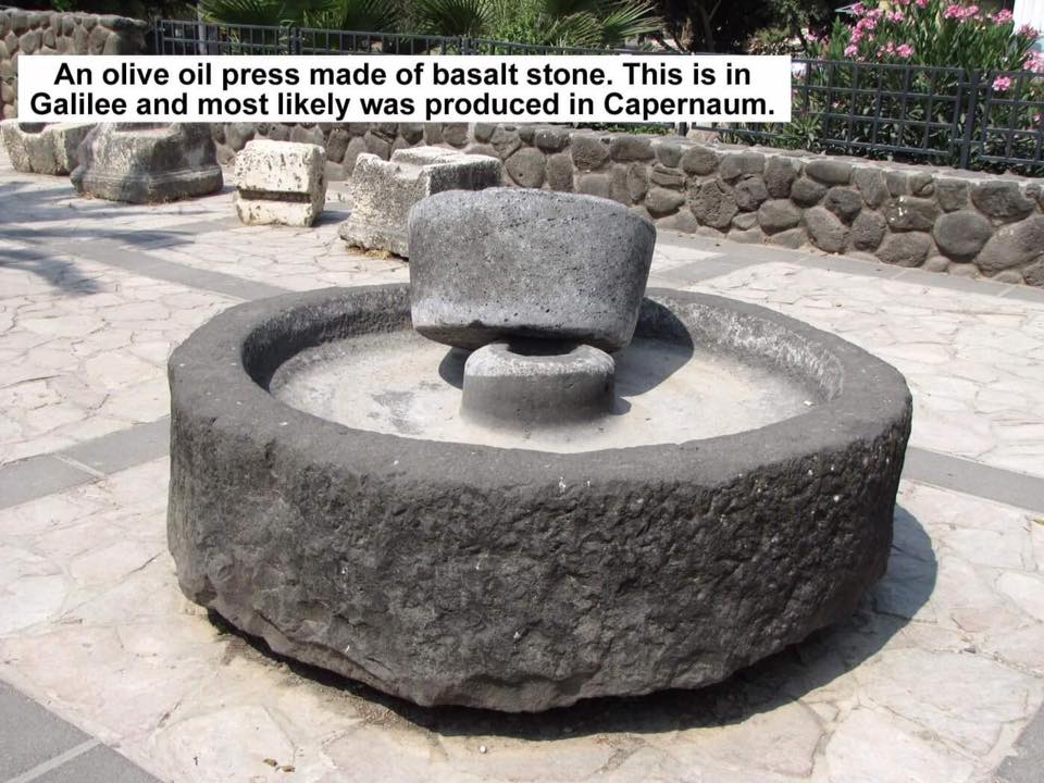 Olive press made of basalt stone