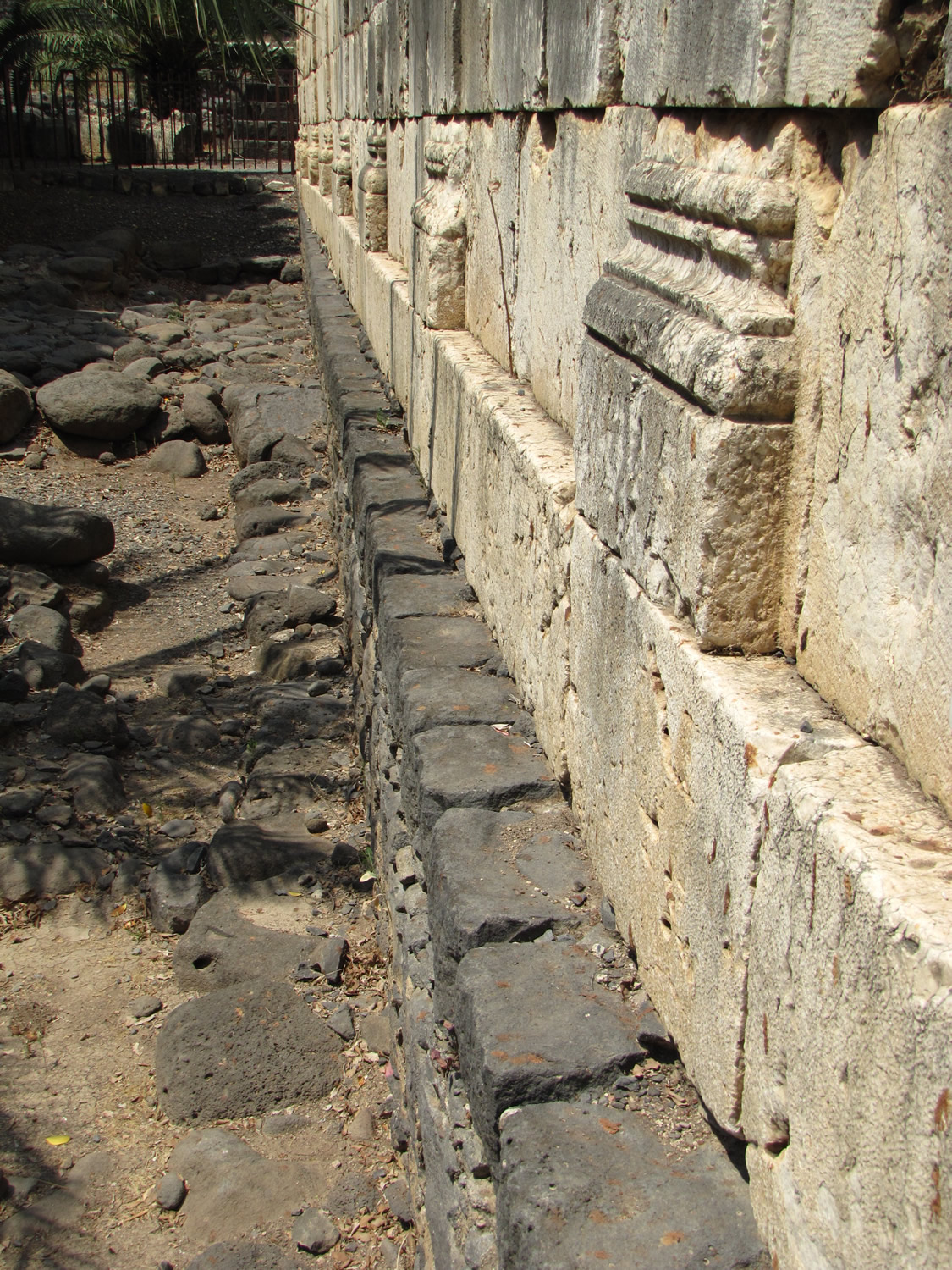Capernaum Synagogue basalt walls of Jesus time